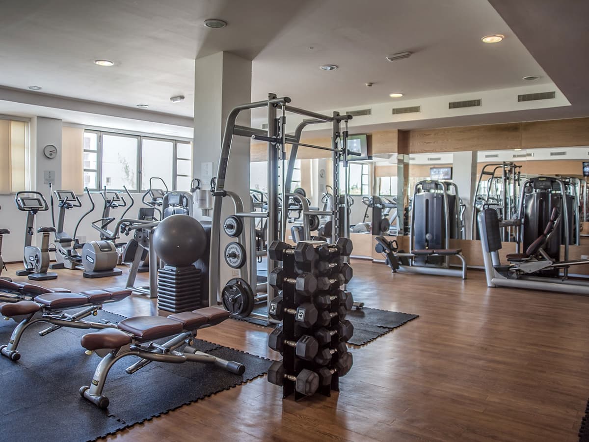 Fully equipped fitness center with modern cardio and weight equipment