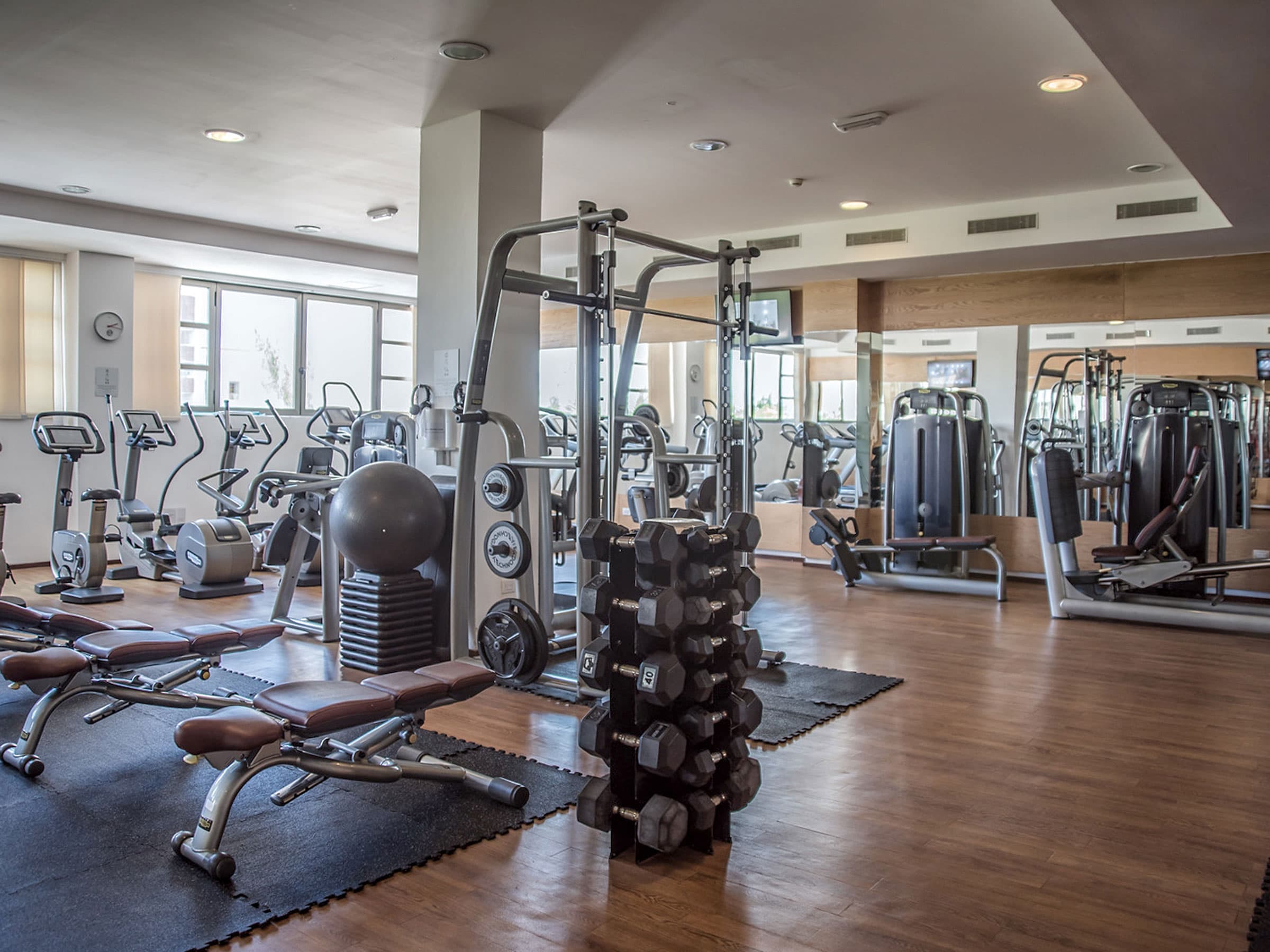 Fully equipped fitness center with modern cardio and weight equipment
