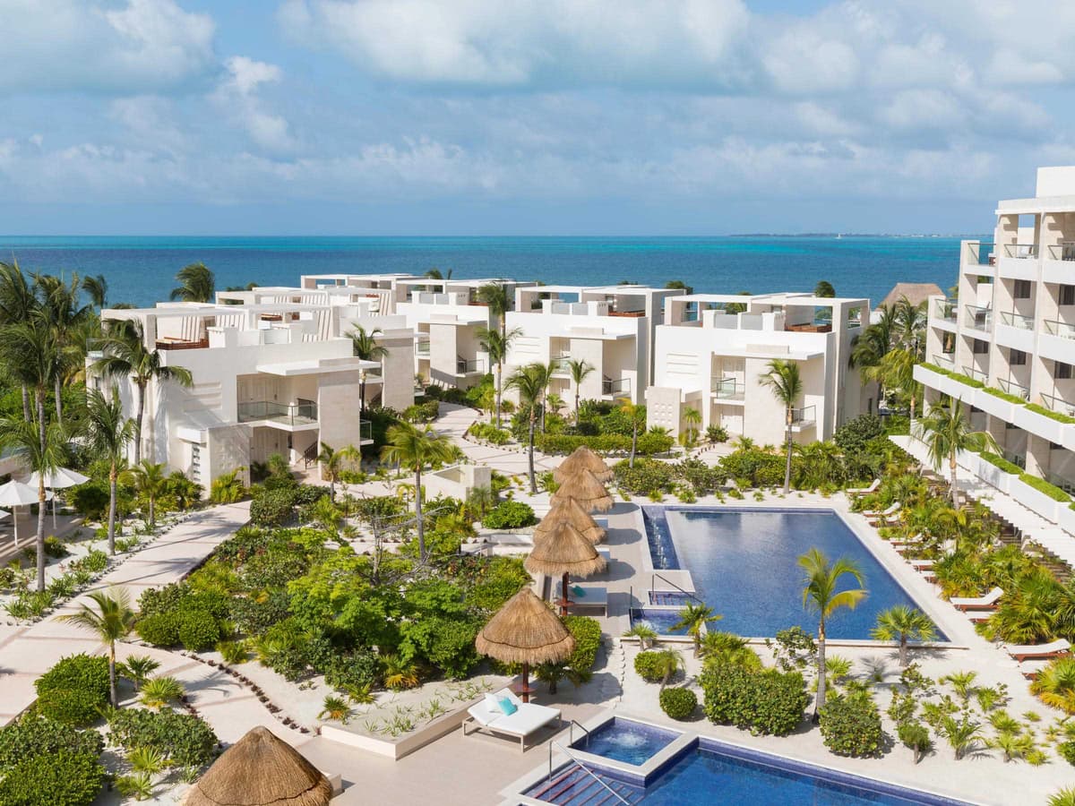 Aerial view of Beloved Playa Mujeres along the white-sand Playa Mujeres coastline