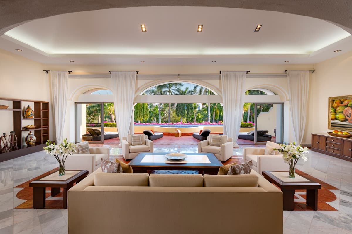 Presidential Suite — master bedroom with original artwork