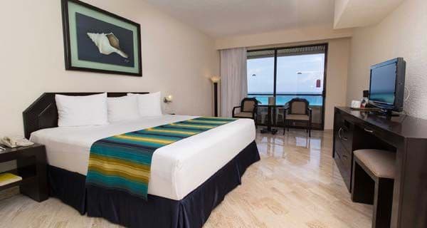 Guest room at Crown Paradise Club Cancun