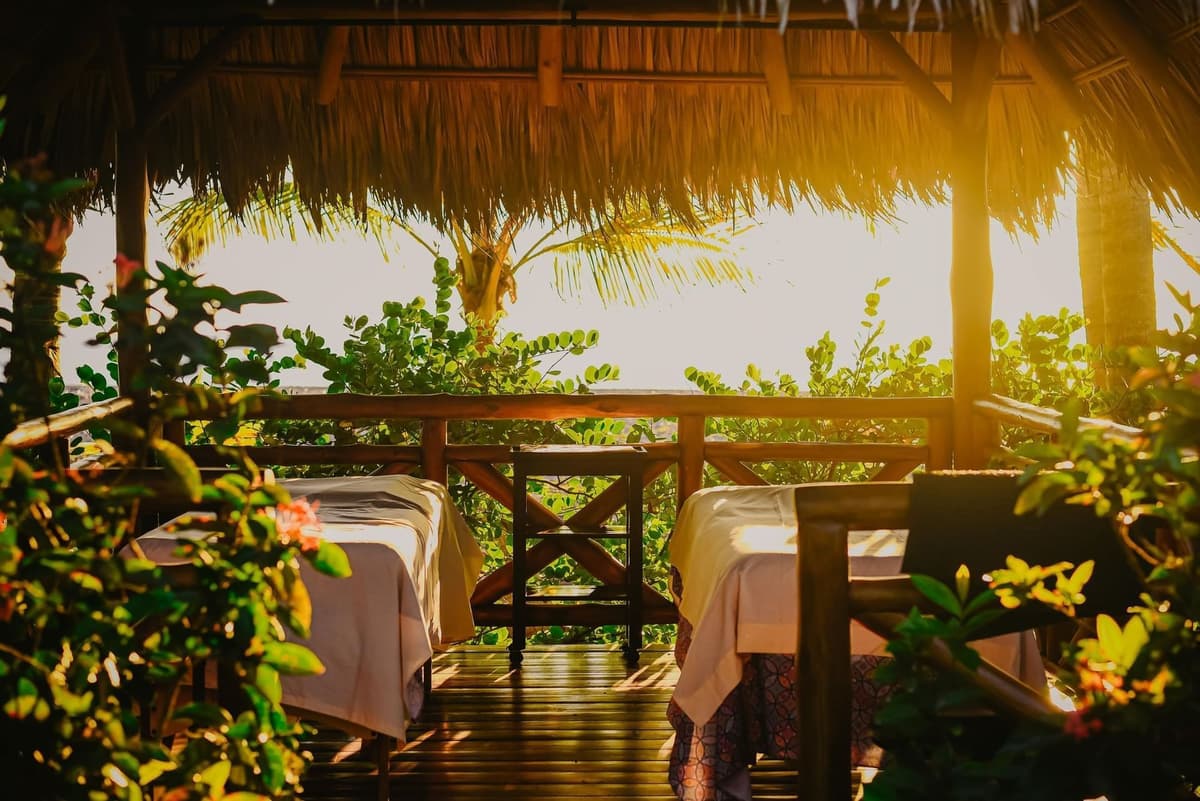 Heliconia Spa oceanfront setting with private treatment bungalows surrounded by tropical gardens