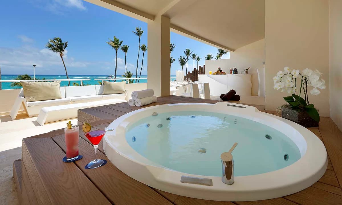 Signature Suite Panoramic Ocean View with expansive living space, premium furnishings, and ocean views