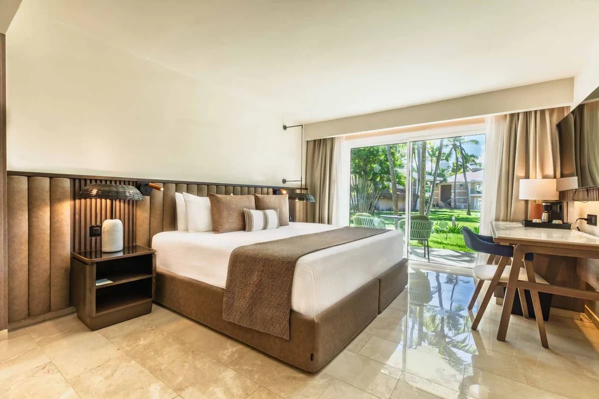 Romance Suite Garden View with double Jacuzzi, romantic decor, and palm-roof terrace