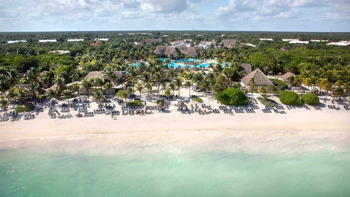 Kantenah Beach with powdery white sand and turquoise Caribbean waters shared across the Riviera Maya complex