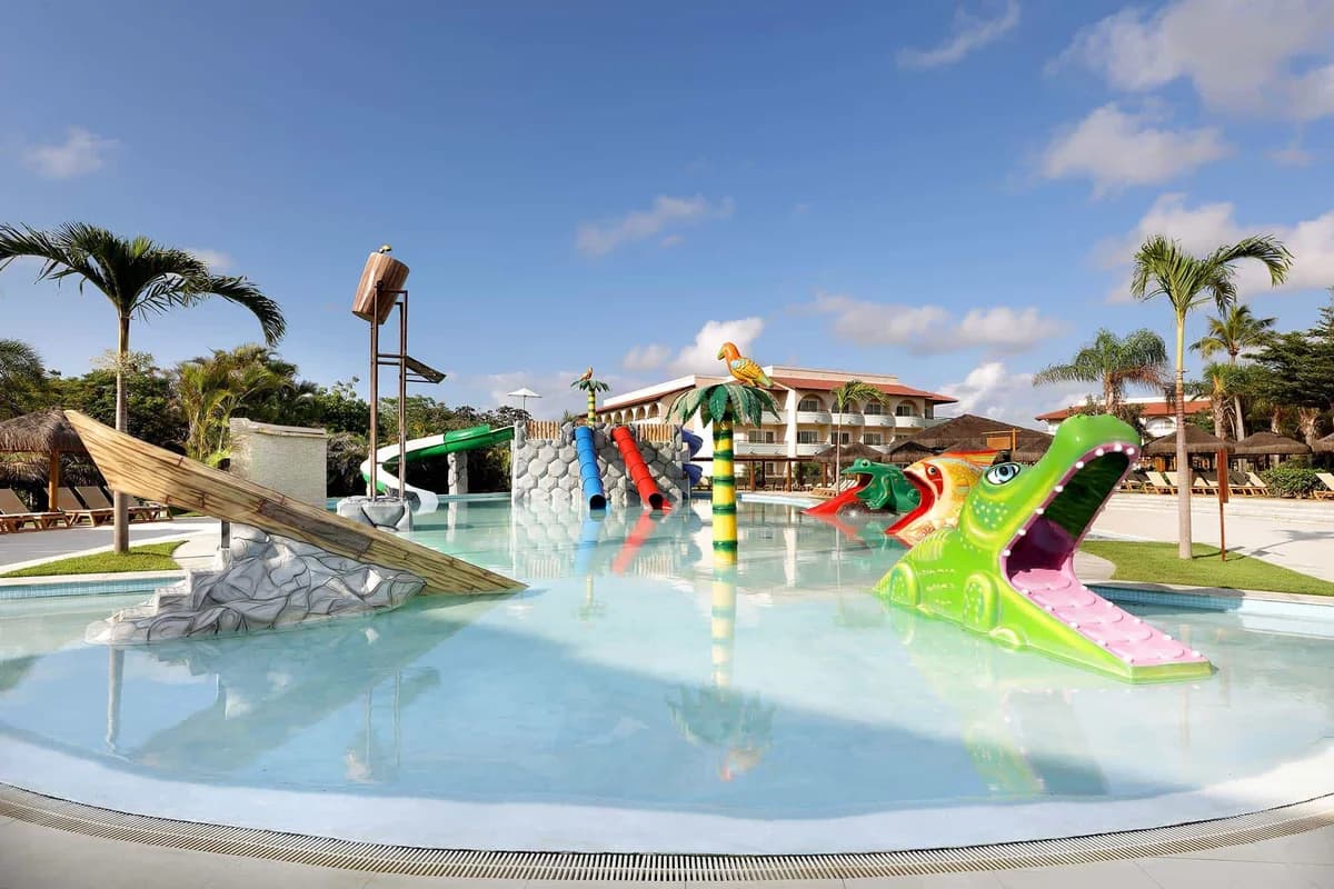 Kids splash pool and water play area with slides at Grand Palladium Imbassai