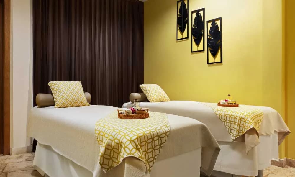 Zentropia spa outdoor relaxation area surrounded by tropical landscaping