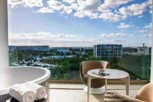 Loft Suite Jacuzzi Terrace featuring two-story duplex layout with private Jacuzzi on the furnished terrace