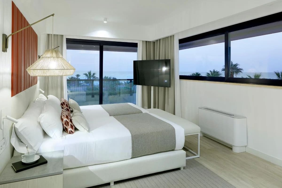 Guest room at Grand Palladium Sicilia Resort & Spa
