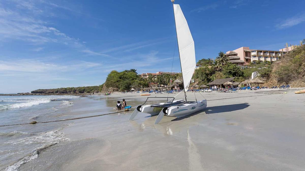 Tropical jungle pathways and lush gardens surrounding the resort buildings