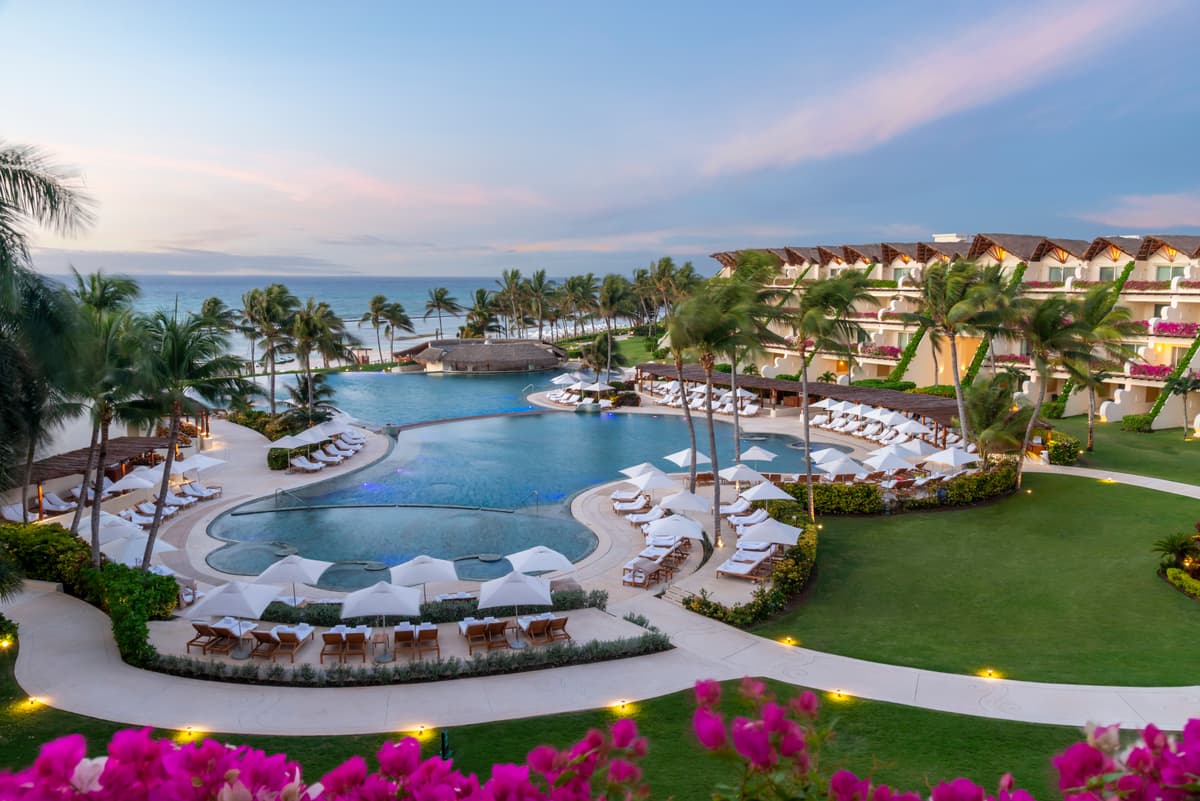 Three-tiered Ambassador infinity pool with ocean views
