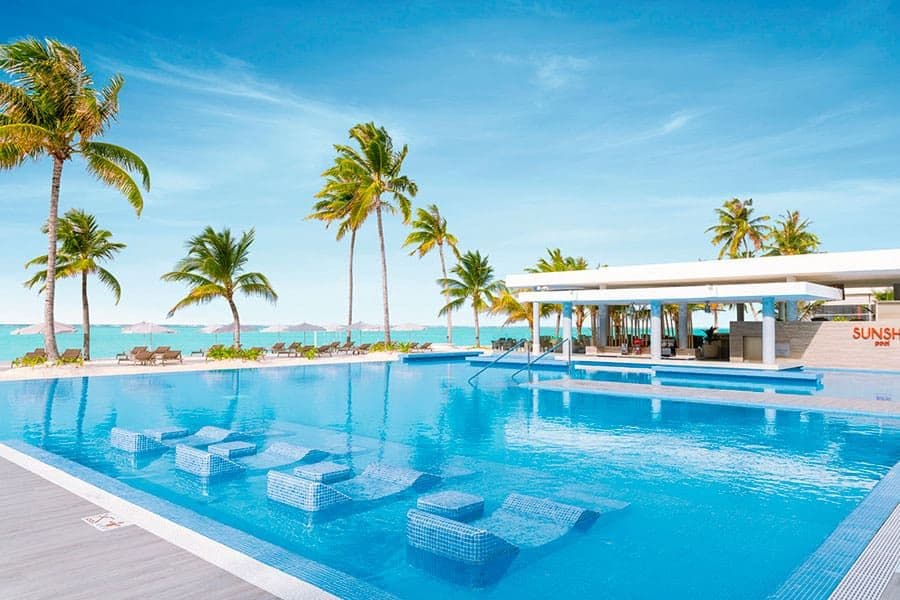 Swimming pool area at Hotel Riu Atoll