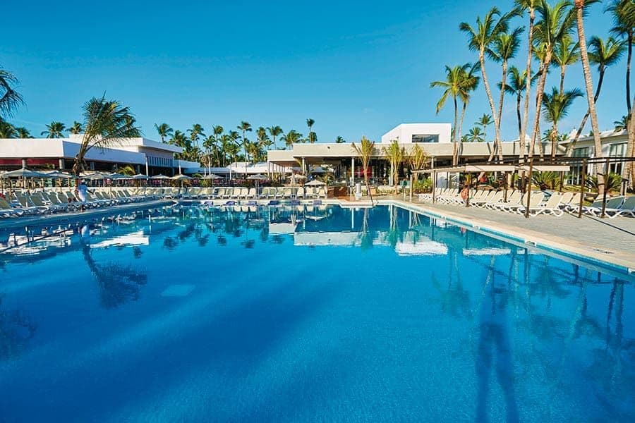 Swimming pool area at Hotel Riu Bambu
