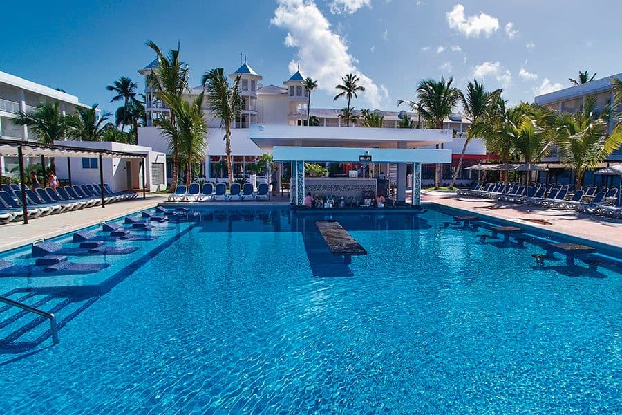 Swimming pool area at Hotel Riu Bambu