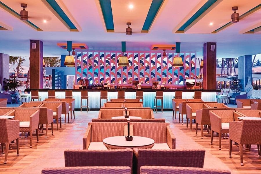 Swimming pool area at Hotel Riu Bambu