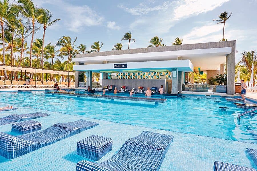 Swimming pool area at Hotel Riu Bambu
