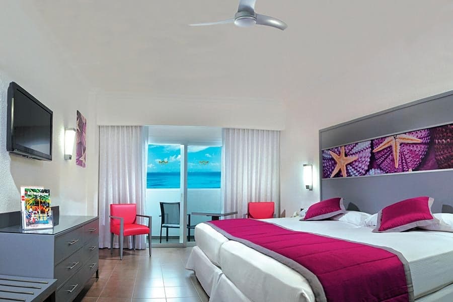 Guest room at Hotel Riu Cancun