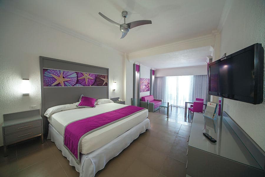 Guest room at Hotel Riu Cancun