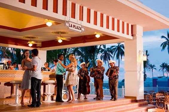 Swimming pool area at Hotel Riu Emerald Bay