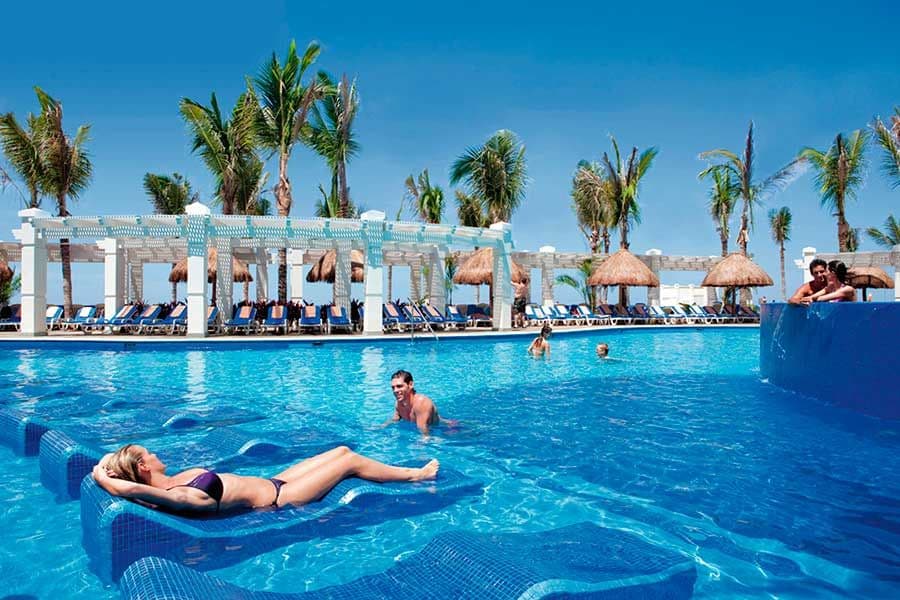 Swimming pool area at Hotel Riu Emerald Bay