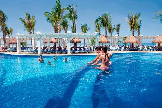 Swimming pool area at Hotel Riu Emerald Bay