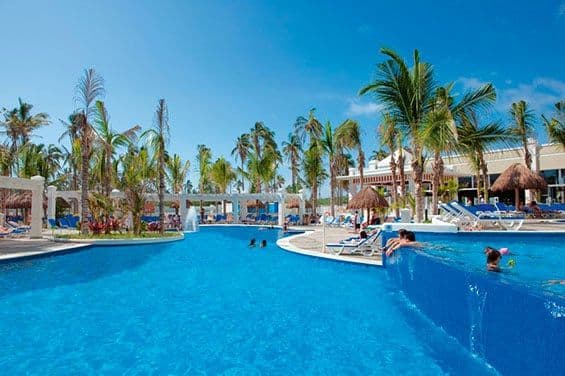 Swimming pool area at Hotel Riu Emerald Bay