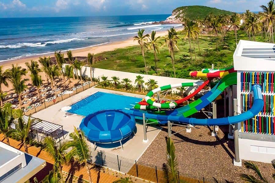 Swimming pool area at Hotel Riu Emerald Bay