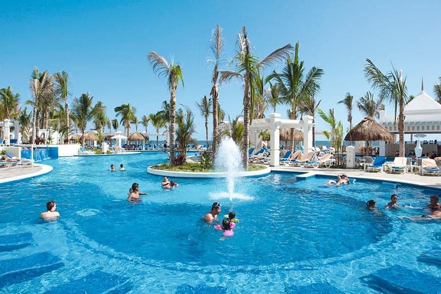 Swimming pool area at Hotel Riu Emerald Bay