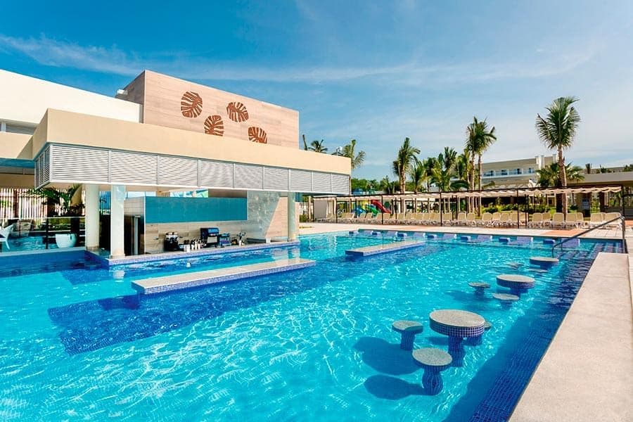 Swimming pool area at Hotel Riu Emerald Bay
