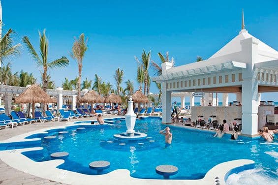 Swimming pool area at Hotel Riu Emerald Bay