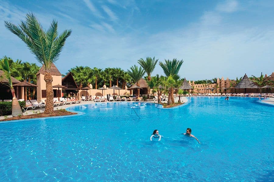 Swimming pool area at Hotel Riu Funana