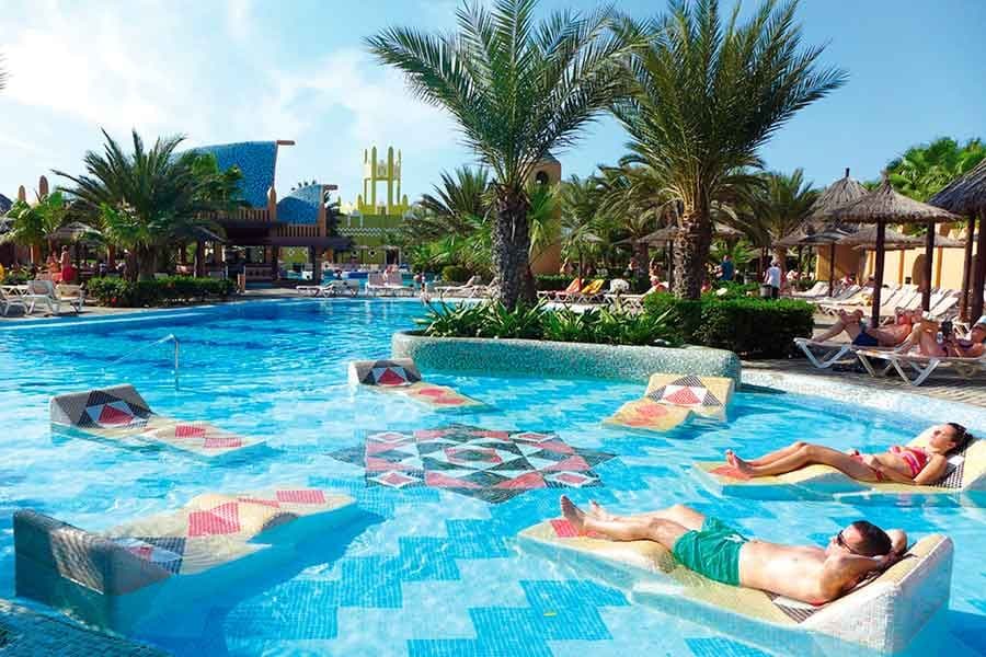 Swimming pool area at Hotel Riu Funana