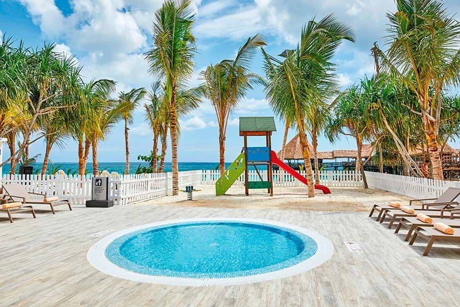 Swimming pool area at Hotel Riu Jambo