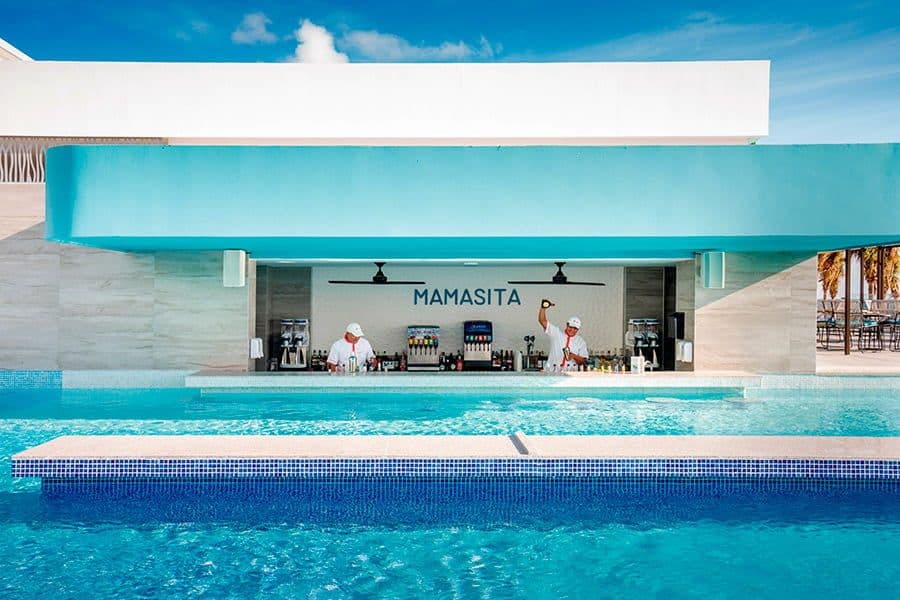Swimming pool area at Hotel Riu Palace Kukulkan