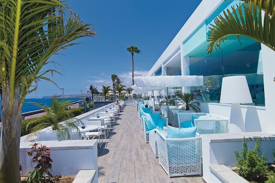 Swimming pool area at Hotel Riu Palace Meloneras