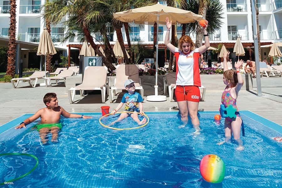 Swimming pool area at Hotel Riu Palace Palmeras