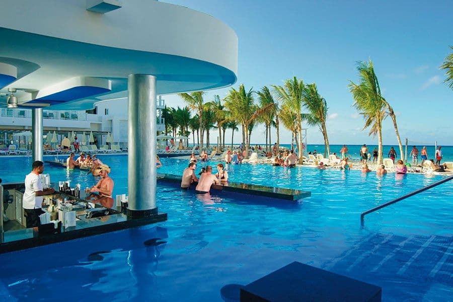 Swimming pool area at Hotel Riu Reggae