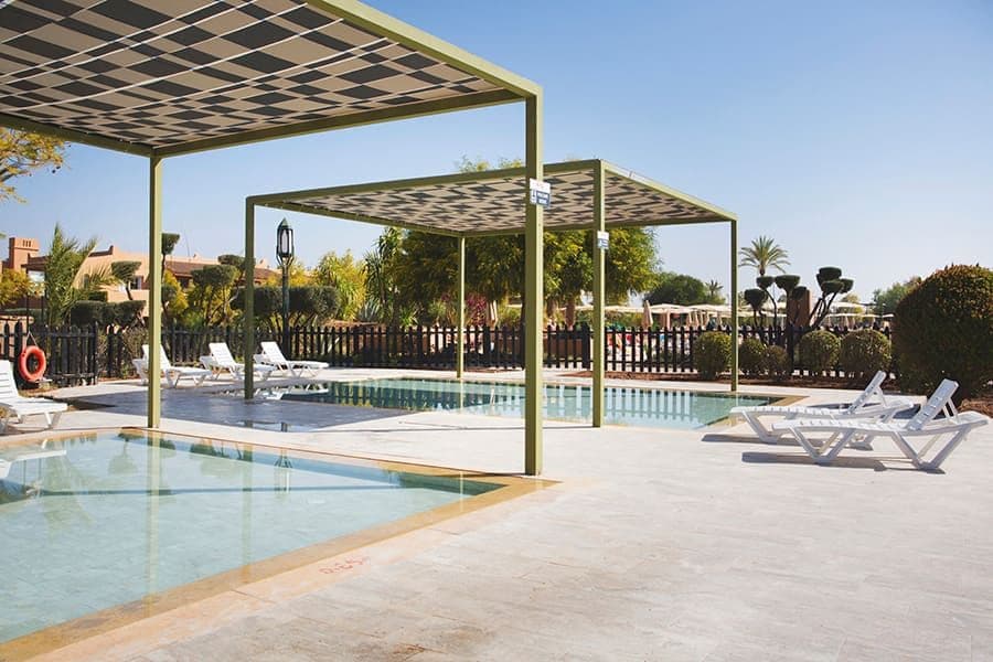 Swimming pool area at Hotel Riu Tikida Palmeraie