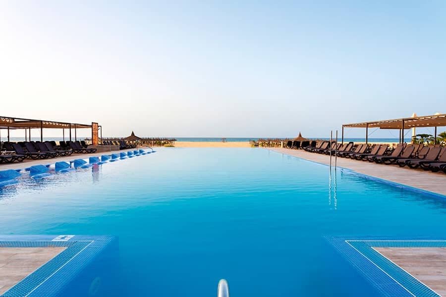 Swimming pool area at Hotel Riu Touareg