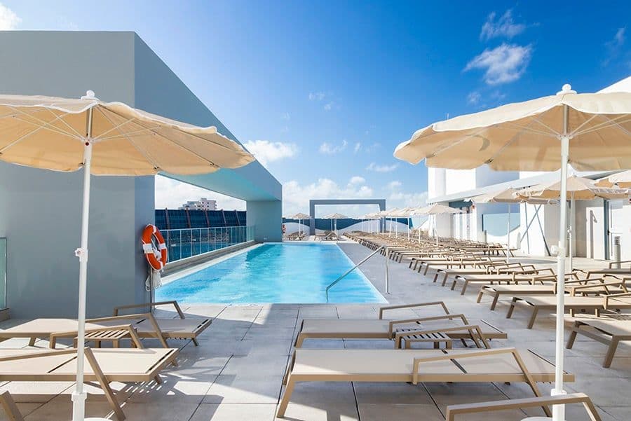 Swimming pool area at Hotel Riu Ventura