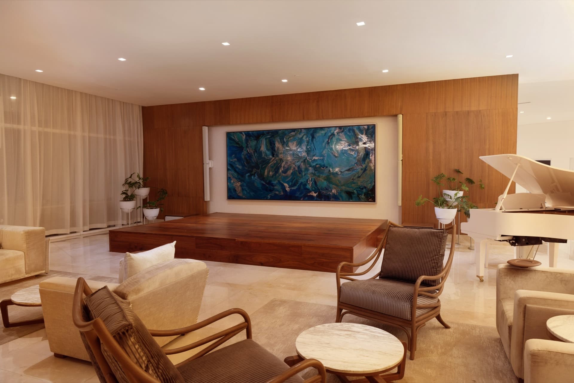 Elegant lobby lounge with grand piano, contemporary art, and warm wood accents
