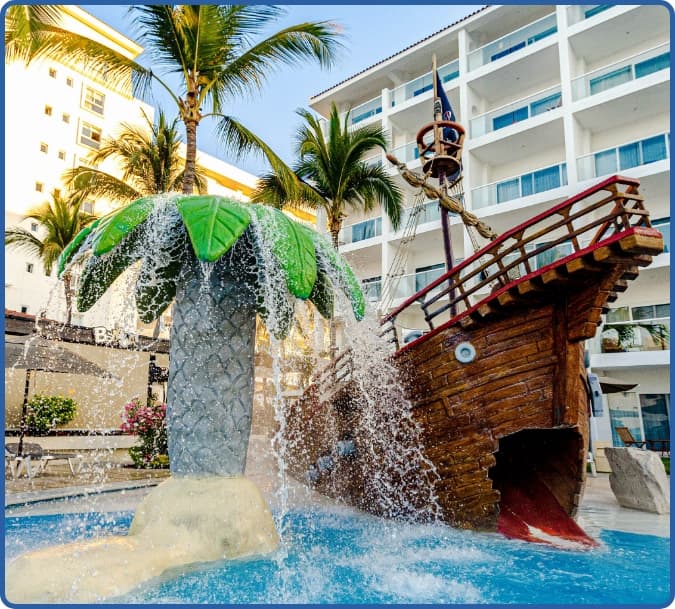 Pirate-themed kids pool with waterslides at Marival Emotions
