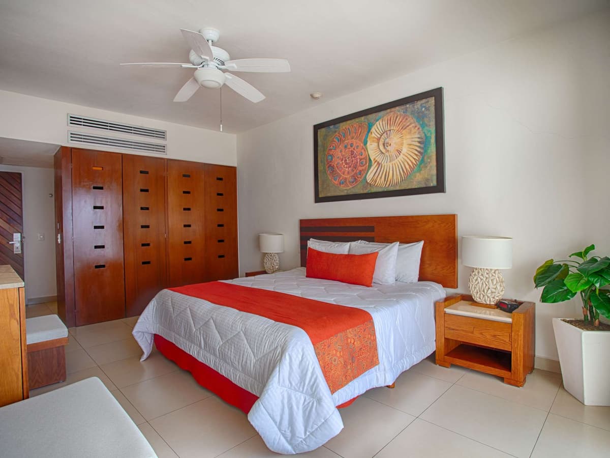 Resort Club king bed room at Marival Emotions Resort