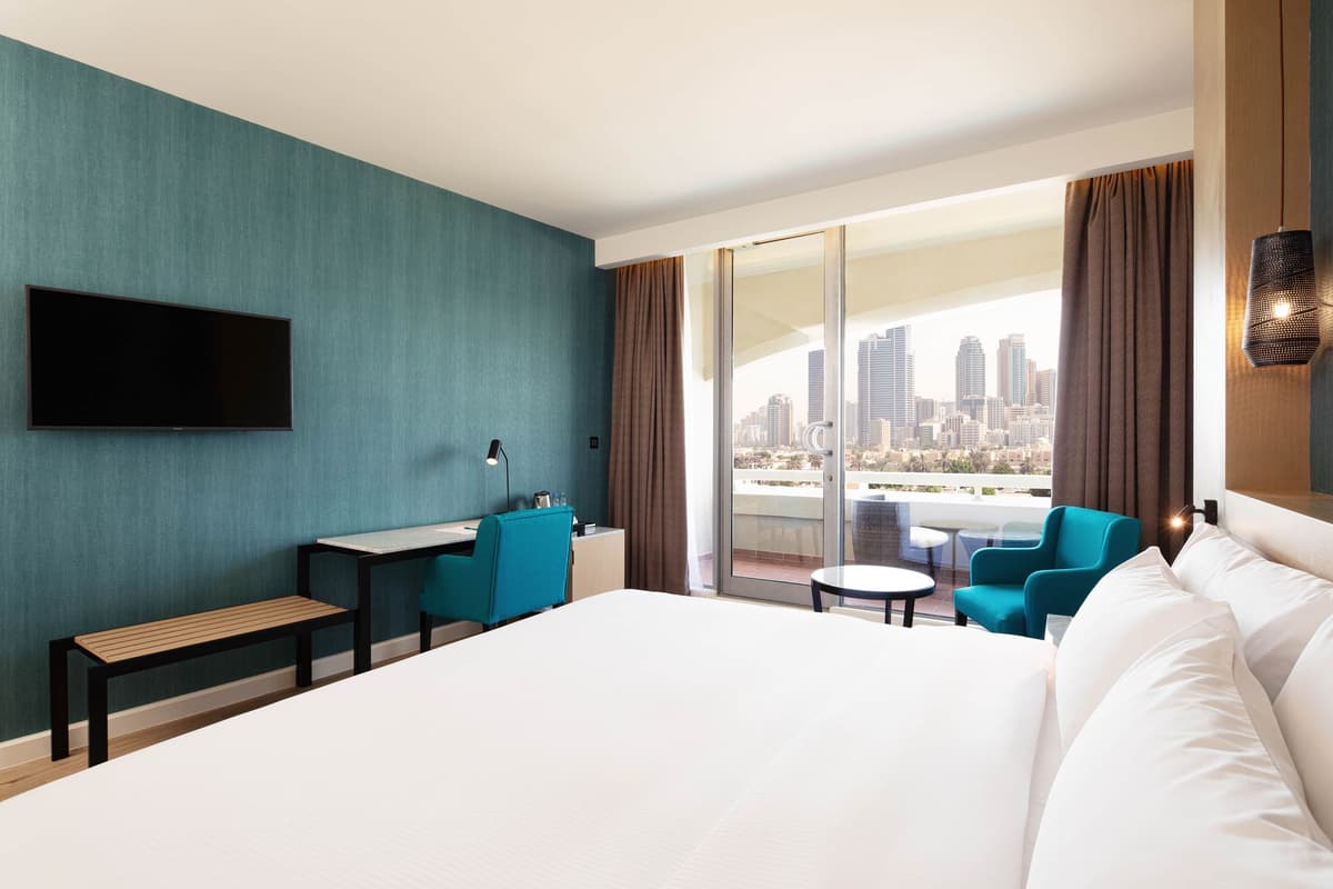 Guest room at Occidental Sharjah Grand