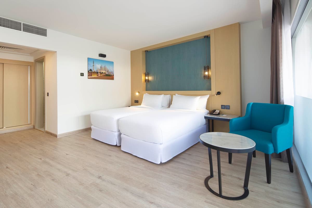 Guest room at Occidental Sharjah Grand