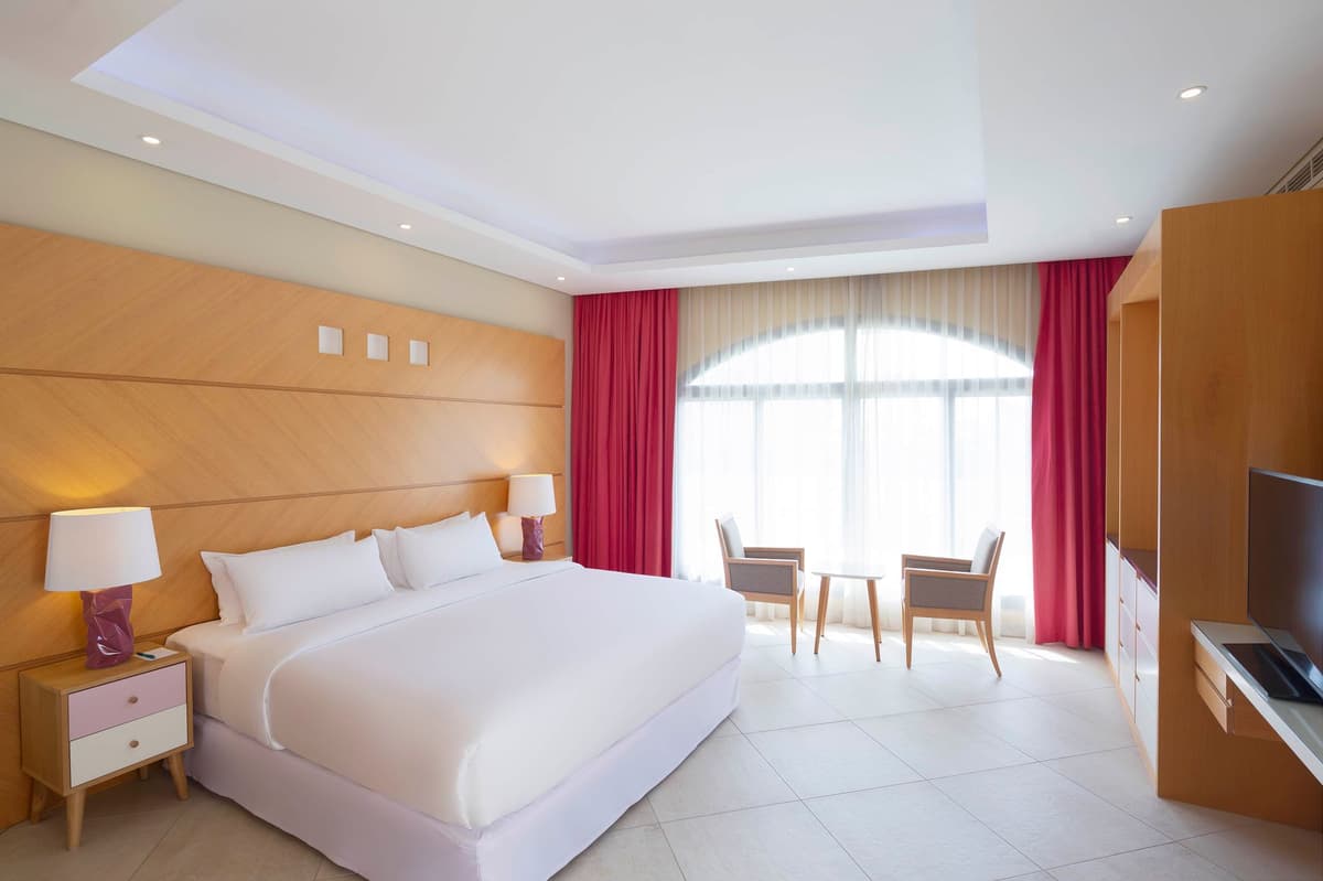 Guest room at Occidental Sharjah Grand