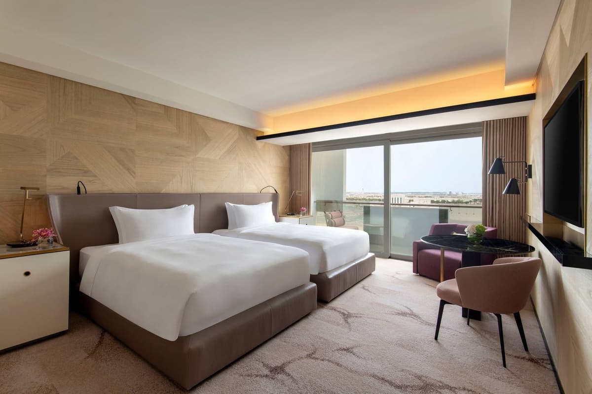 Guest room at Rixos Gulf Hotel Doha