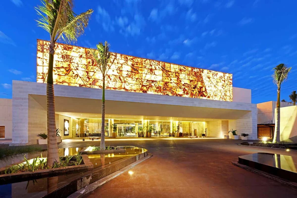TRS Coral Hotel entrance with modern architectural design and tropical landscaping