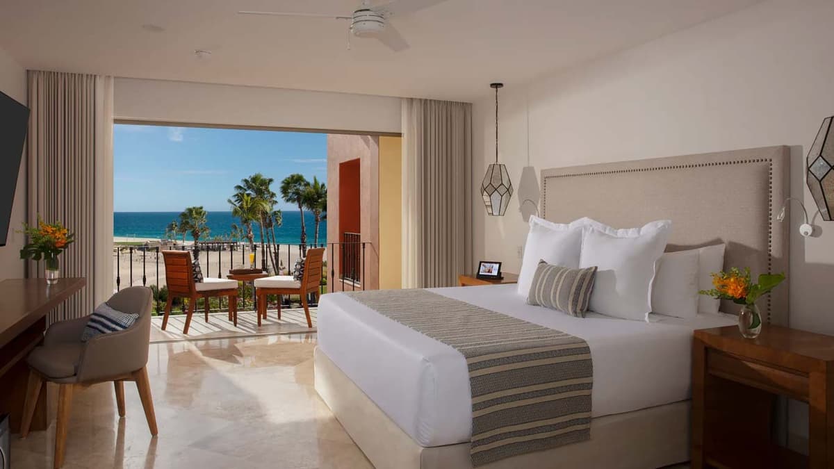 Luxury suite interior with Mexican artwork and private balcony