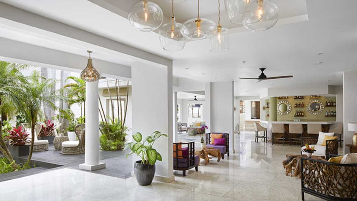 Zoetry Montego Bay open-air lobby with tropical atrium and reception